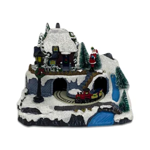 Villa navideña con tren en movimiento y luces a batería